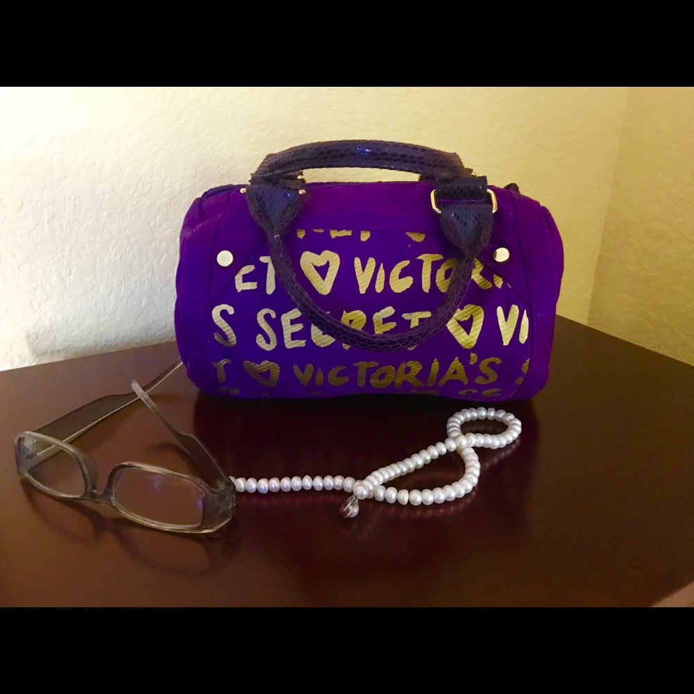 Victoria’s Secret purple roll bag